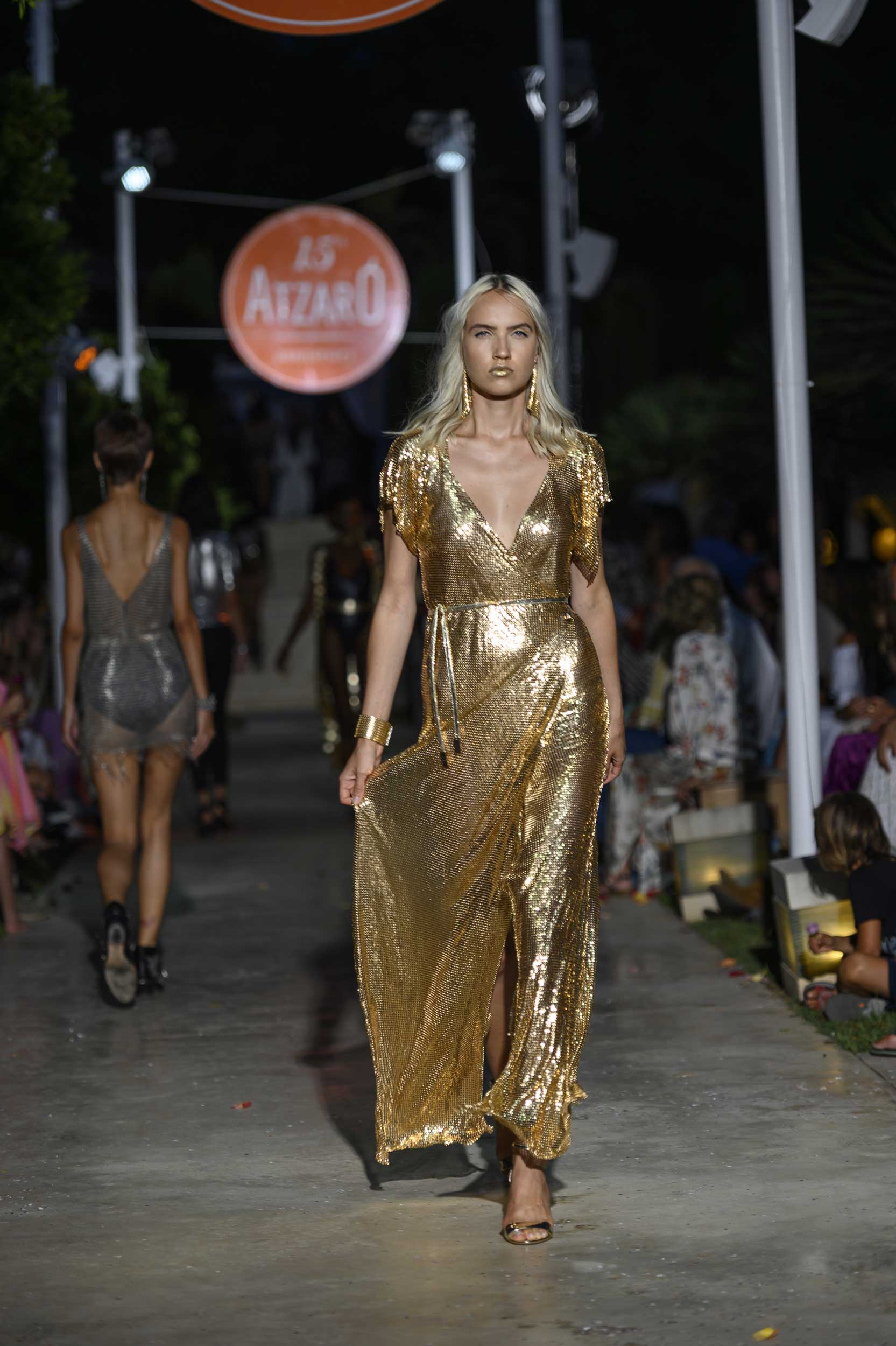 Luxurious gold chainmail maxi dress, floor-length statement gown with a smooth metallic shine