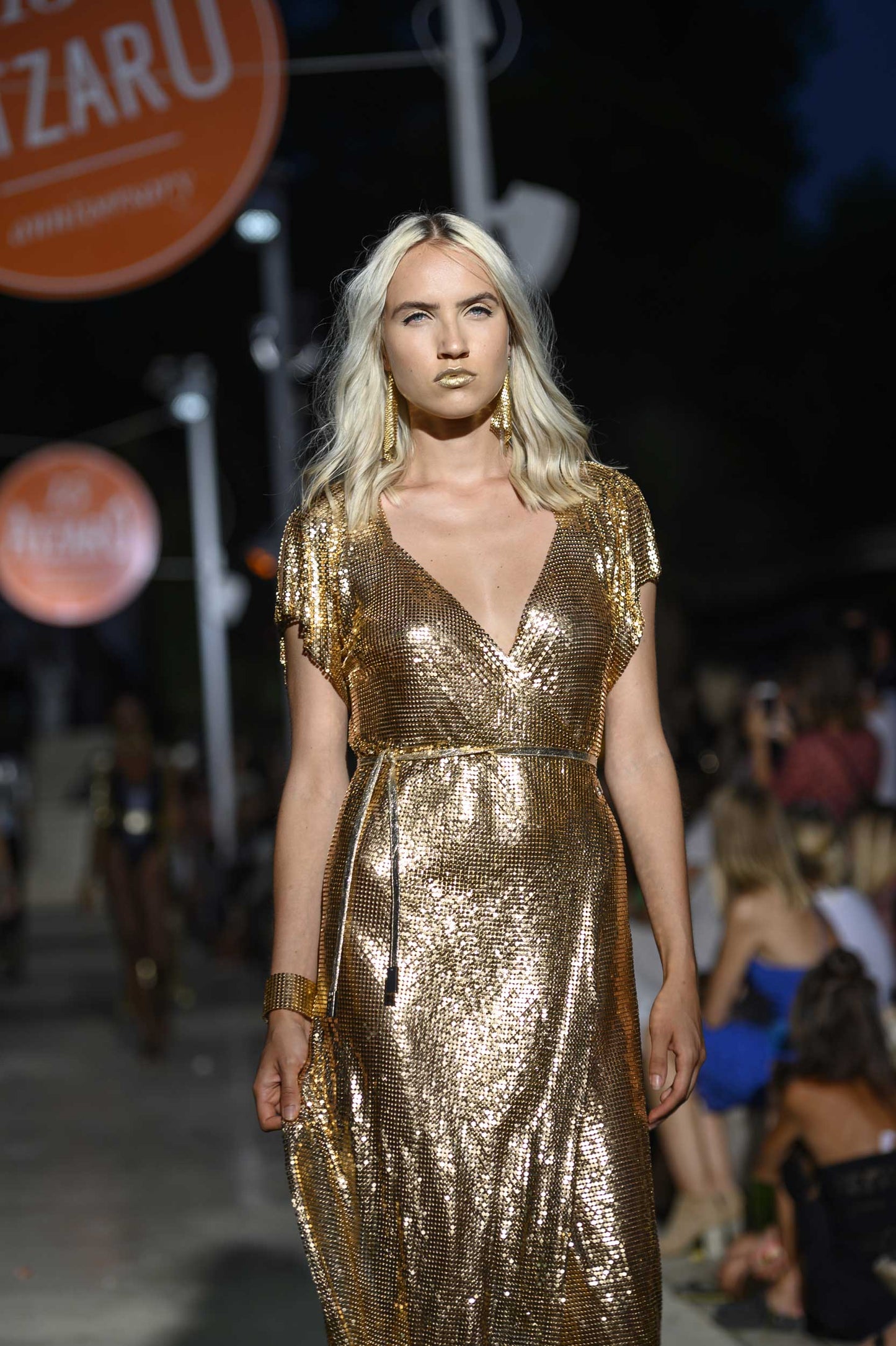 Gold chainmail maxi dress, full-length and luxurious for a bold, glamorous look