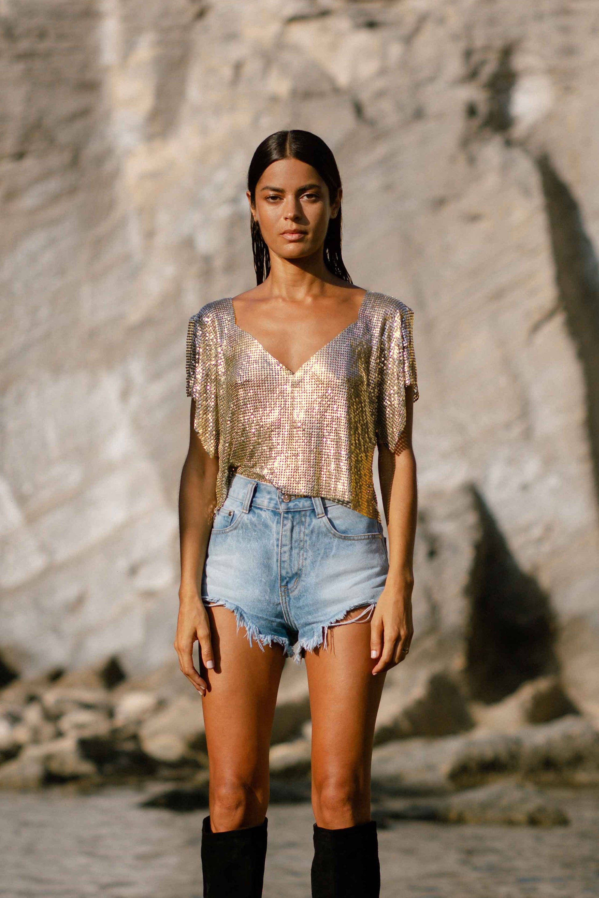Eco-conscious gold V-neck chainmail metal top, slouchy fit with sleek metallic finish