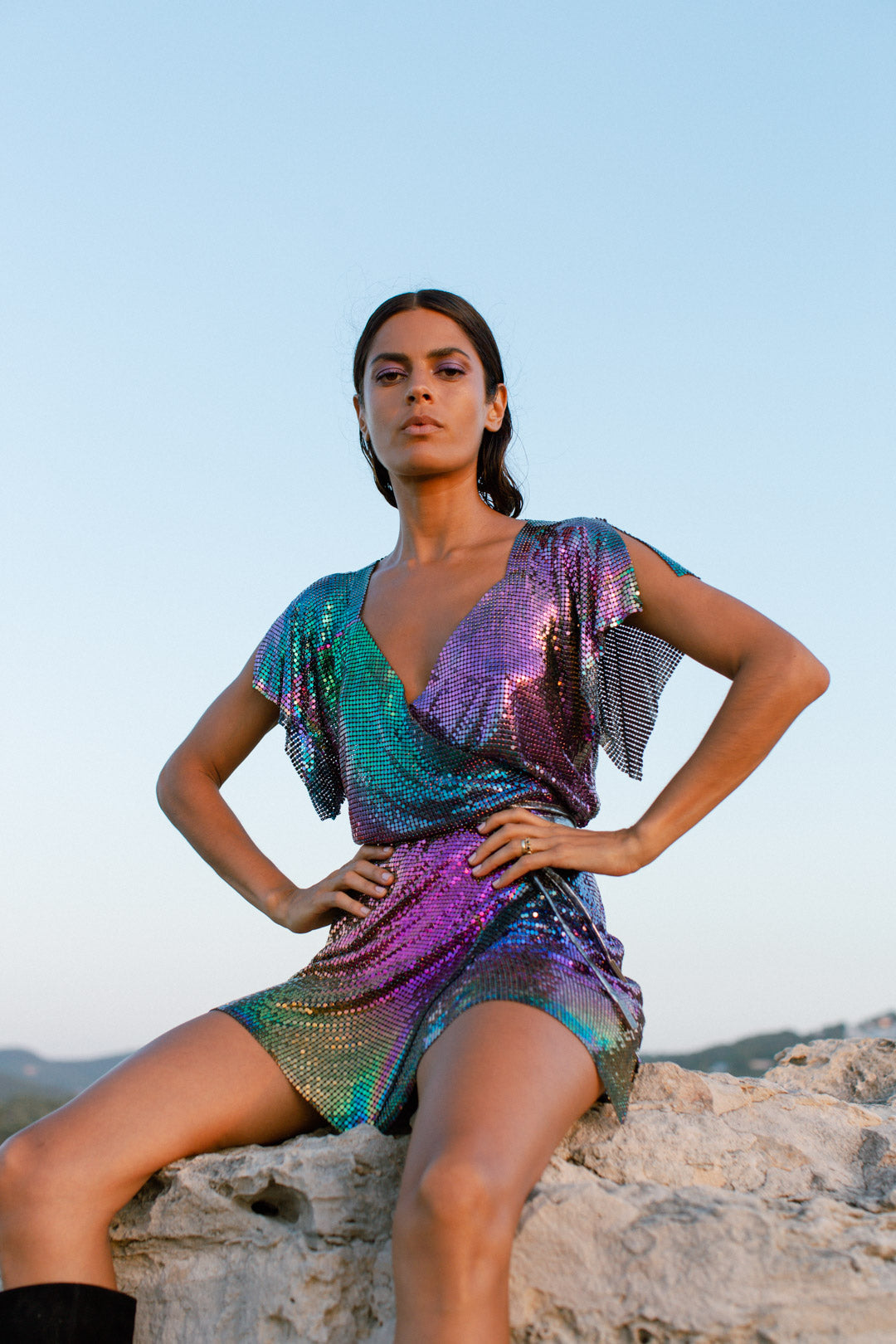 Petrol-colored chainmail dress with shimmering, multi-toned finish, perfect for events