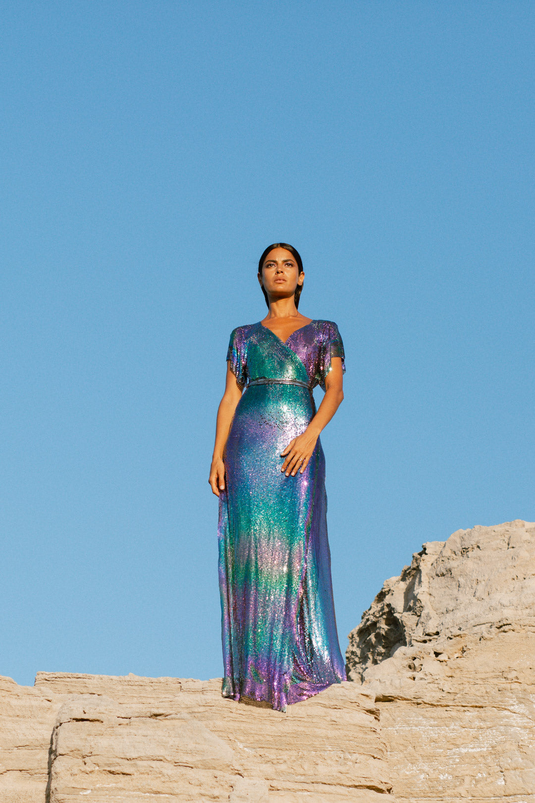 Floor-length petrol chainmail maxi dress with iridescent shimmer, a show-stopping statement gown