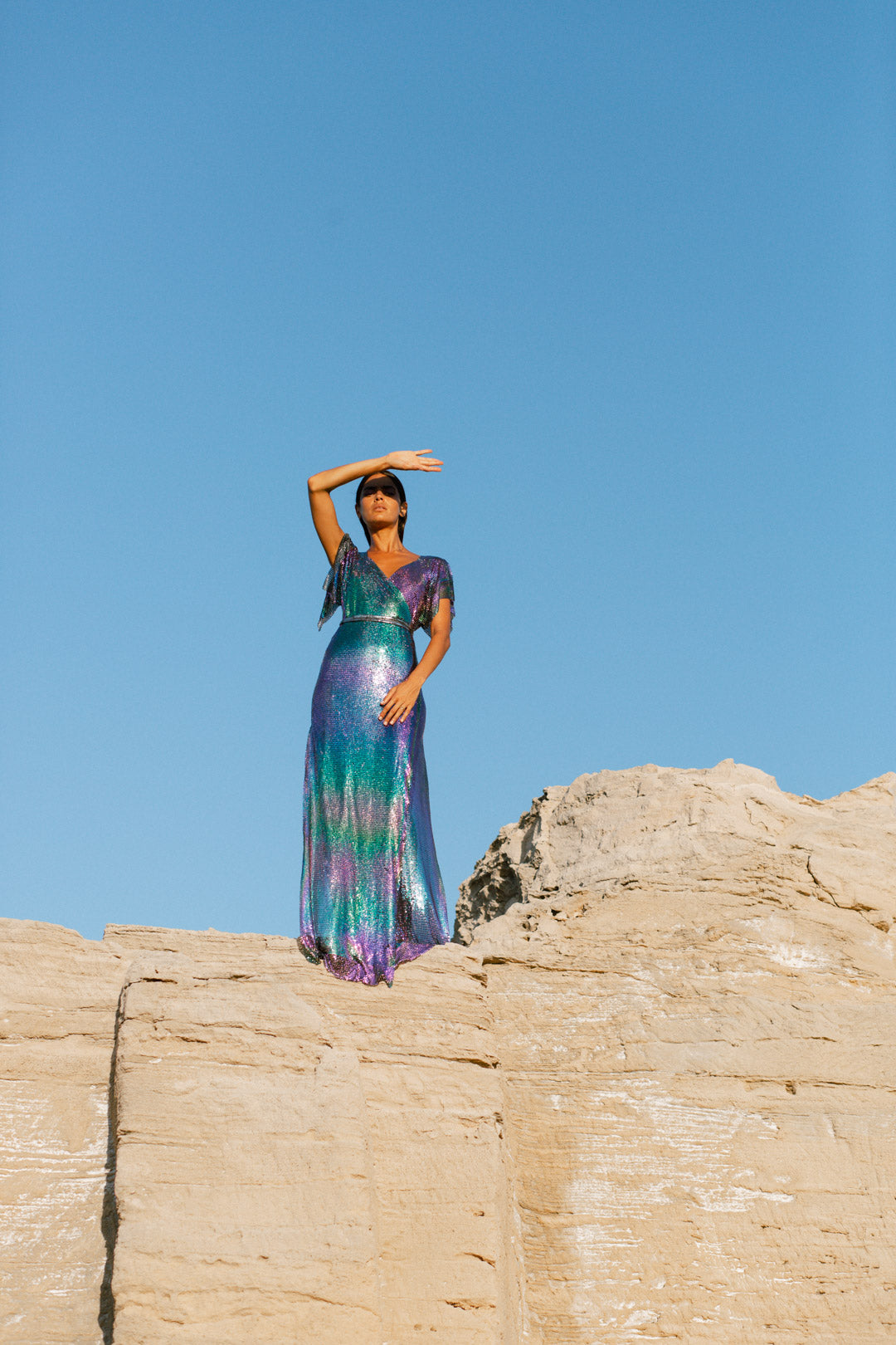Petrol iridescent chainmail maxi dress, full-length with multi-colored shine for a bold, glamorous look