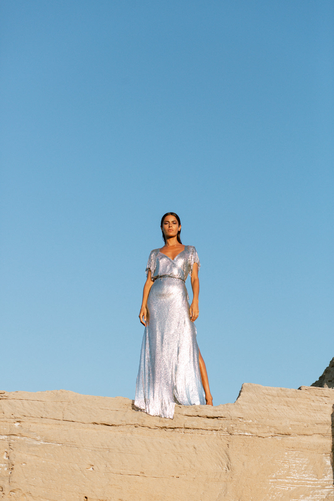 Elegant silver chainmail maxi dress, floor-length statement gown with a polished metallic shine